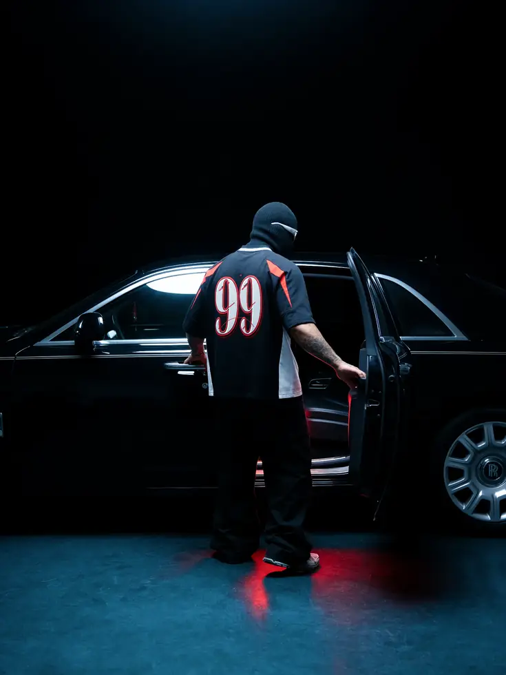 MIROSS jersey back 99 — luxury car night editorial