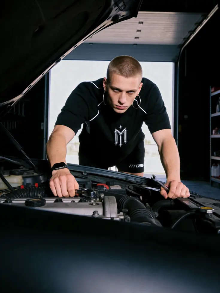 MIROSS crest raglan tee & shorts — garage mechanic editorial